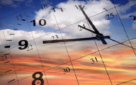 Clock face and calendar on sky