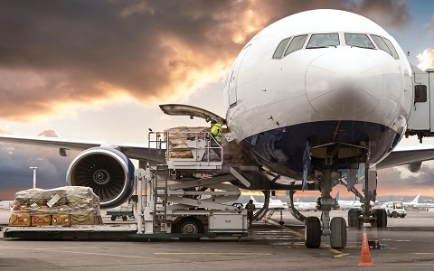 loading cargo into the aircraft before departure