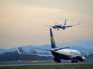 Many airplanes Ryanair Boeing 737 are approaching the runway at the Milano Bergamo International Airport