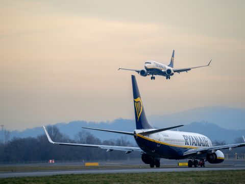 Many airplanes Ryanair Boeing 737 are approaching the runway at the Milano Bergamo International Airport